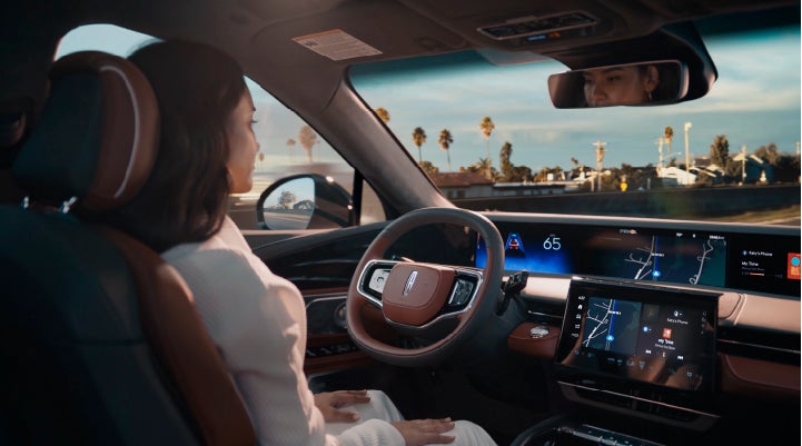 A person is shown driving hands-free on the highway with available Lincoln BlueCruise technology. | Griffin Lincoln in Tifton GA