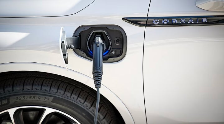 An electric charger is shown plugged into the charging port of a Lincoln Corsair® Grand Touring
model. | Griffin Lincoln in Tifton GA